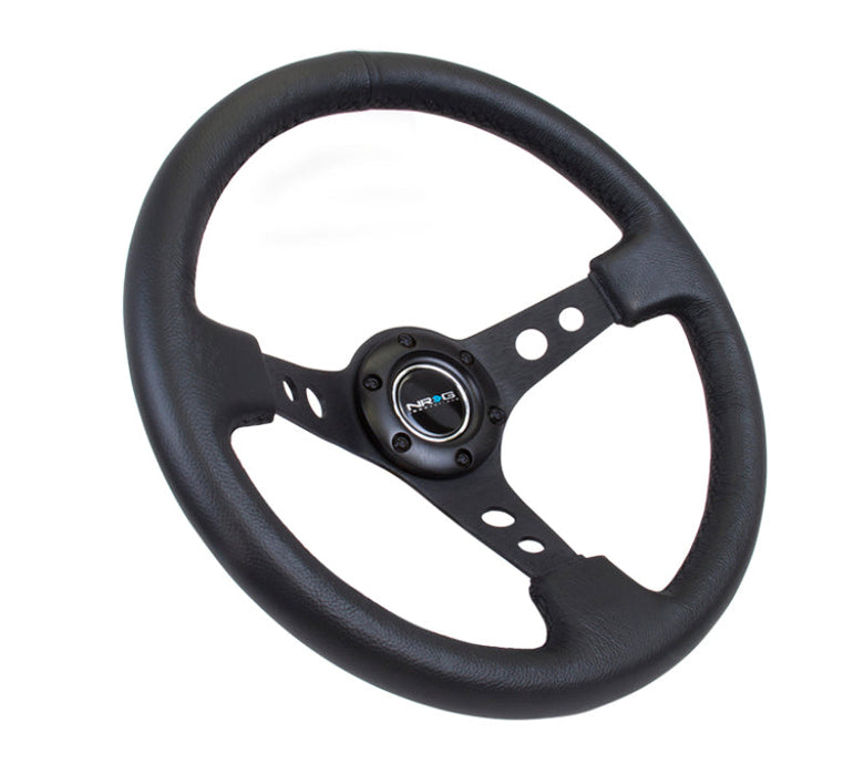 NRG Reinforced Steering Wheel (350mm / 3in. Deep) Blk Leather w/Blk Spoke & Circle Cutouts - Premium Steering Wheels from NRG - Just $134! Shop now at WinWithDom INC. - DomTuned